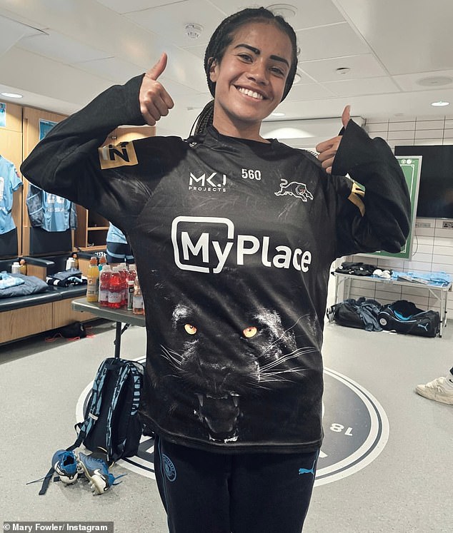 Fowler posted this photo of her wearing her boyfriend's jersey in the Manchester City dressing room shortly after Penrith's stunning premiership win