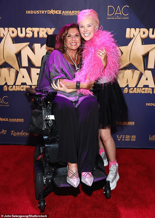 Abby Lee defended her from critics, telling DailyMail.com: 'JoJo laughs all the way to the bank' (pictured together in 2022)