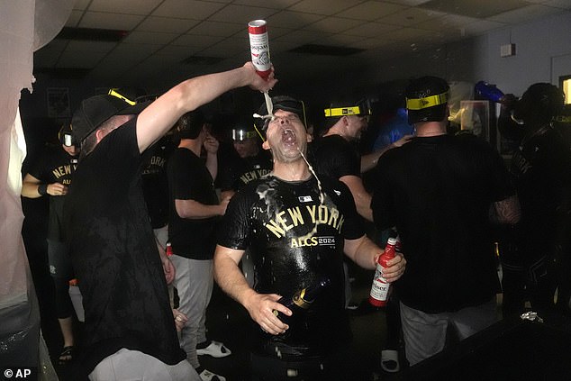 The Yankees enjoyed a drunken locker room party after beating the Royals in four games