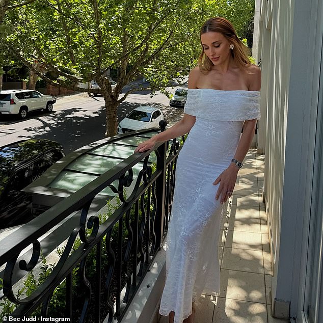 She paired her ensemble with black cat-eye sunglasses as she showed off the cheap and cheerful $59.99 dress, which she wore in both black and white.