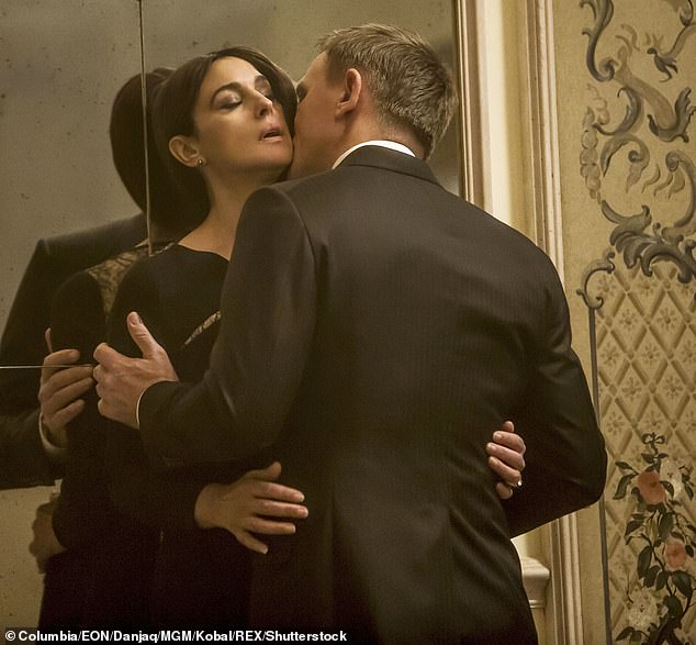 But while promoting his new film Queer, which features raunchy same-sex love scenes, Daniel said: 'I've shot some terrible love scenes in my career. They're there to see' (pictured with Monica Bellucci in 2015's Spectre)