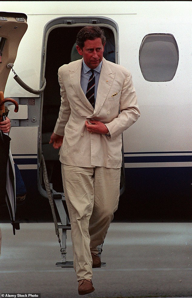 Charles steps off the plane to continue his tour of Australia and New Zealand