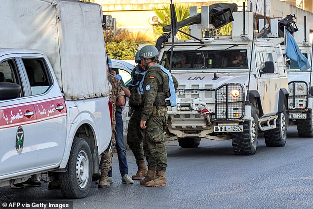 Spanish peacekeepers from the United Nations Interim Force in Lebanon (UNIFIL) coordinate their patrol with the Lebanese Military Police in Marjayoun in southern Lebanon on October 8, 2024