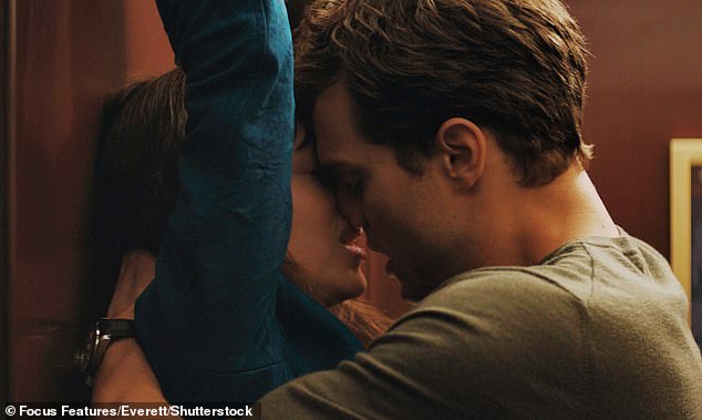 Jamie is pictured with Dakota Johnson in Fifty Shades of Grey