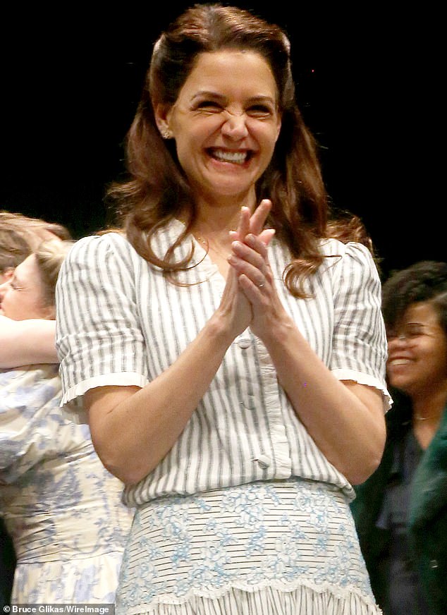 Katie beamed during the curtain call after her performance