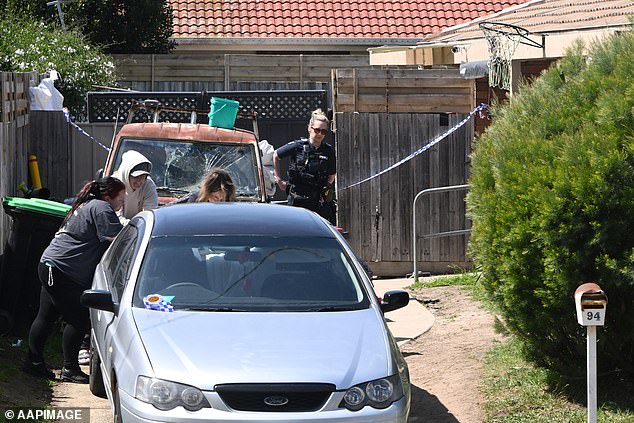 Three dogs were shot dead at the Dandenong home after Mrs Garrett, in her 20s, was brutally attacked