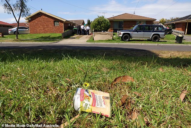 The property on Ross Street is littered with rubbish and has several broken windows