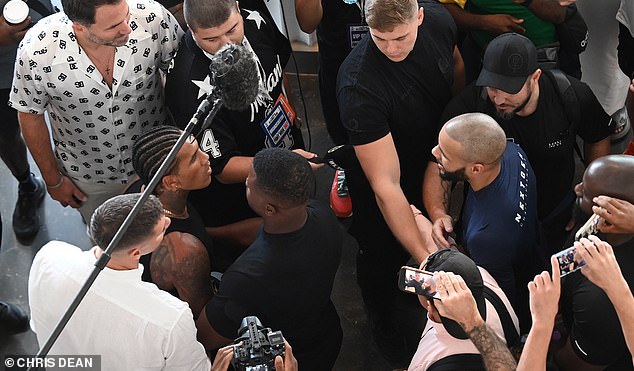 Security guards had to intervene after Benn pushed Eubank Jnr, who remained calm