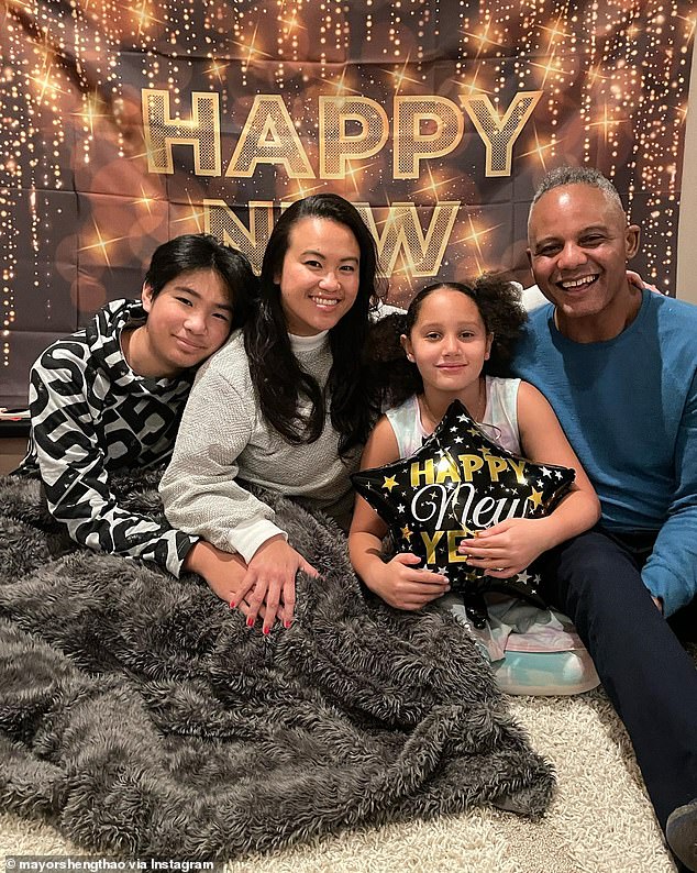 The FBI who raided the home of Oakland Mayor Sheng Thao last month reportedly left behind a phone belonging to her partner Andre Jones (above left). The couple is seen together in their shared home with Thao's 17-year-old son and her and Jones' 11-year-old daughter.