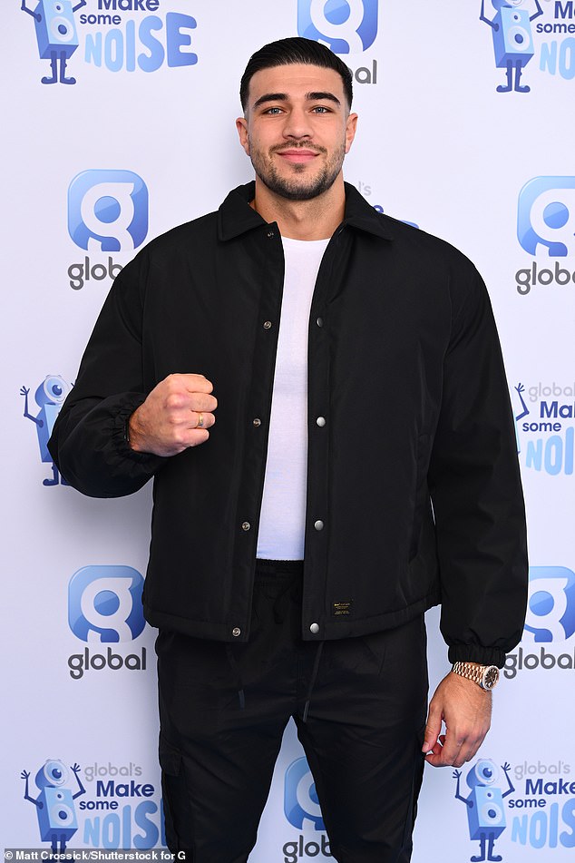 Tommy Fury opted for a more relaxed look as he arrived at the event in a black shirt and matching trousers