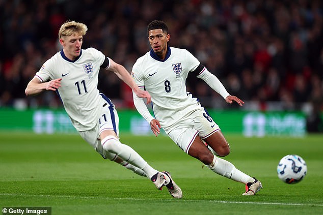 It was a night to forget as Jude Bellingham (right) was asked to act as striker