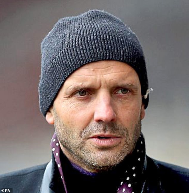 Paul Tisdale, pictured wearing a hat in November 2020, is Celtic's new head of recruitment