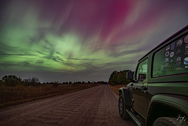 A hue of purple and green curtains of light was captured in Zimmerman, Minnesota