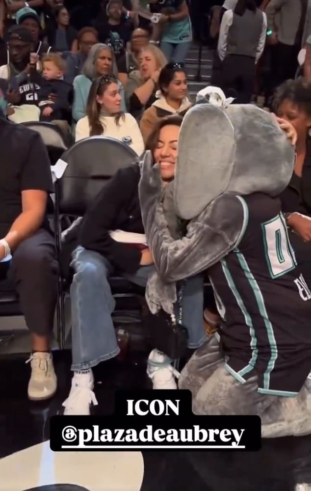 Aubrey was in a good mood when the Liberty mascot came up to her