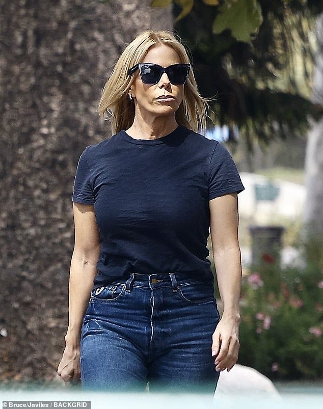 Hines kept her look casual, wearing a black T-shirt and jeans. Her face was impossible to read behind the large dark sunglasses she wore, but she was not wearing a ring, as she has often been seen lately