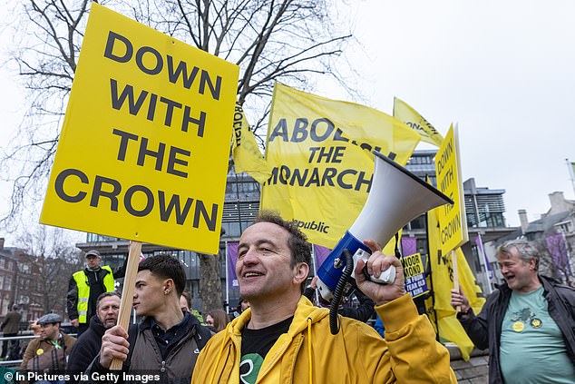 Graham Smith, CEO of Republic, is pictured protesting against the monarchy opposite Westminster Abbey on March 11