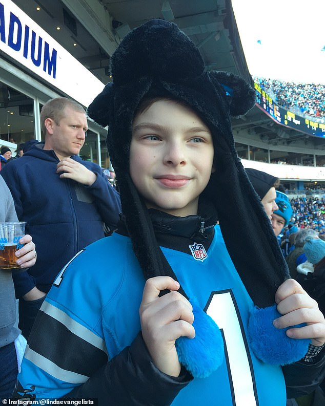 In one photo, her son was seen wearing a blue jersey as he cheered on the Carolina Panthers at an NFL game