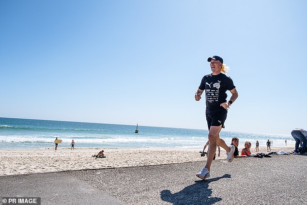 Brockmann attempts to jog 1,600 kilometers in 10 days - he became a sporting legend after running from Perth to Sydney to raise awareness and funds for the homeless