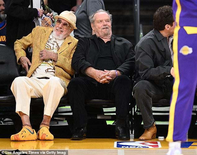 Jack Nicholson (right) and Lou Adler (left) were constant presences at Lakers games