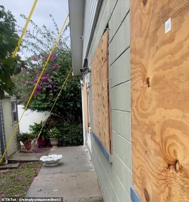 The family also boarded up the windows to prevent them from blowing in during the high winds