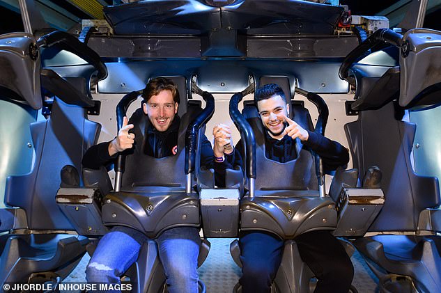 During the terrifying evening, Junior made sure he made the most of the rides and stopped for a moment to take a sweet photo with one of his pals