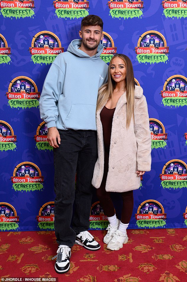 Ciaran Davies and Nicole Samuel also put on a fun appearance on the red carpet as they snuggled up for photos