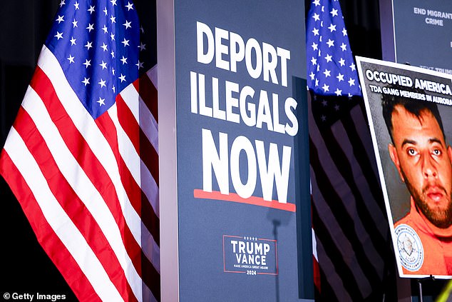 Signs are placed on stage before Republican presidential candidate, former U.S. President Donald Trump, speaks during a rally at the Gaylord Rockies Resort and Convention Center on October 11, 2024 in Aurora, Colorado. Trump is campaigning in key states ahead of the November 5 presidential election