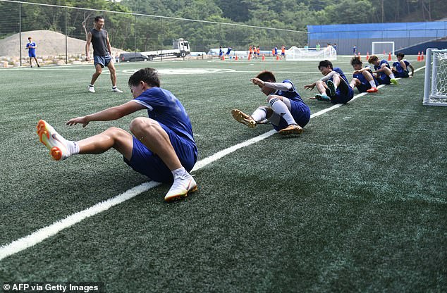 Son Woong-jung pictured (top left) supervising a training session in Chuncheon in July 2018