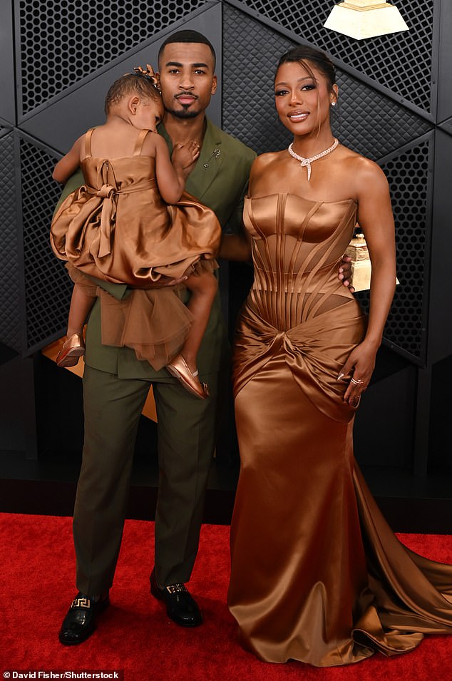 Victoria previously dated fitness trainer John Gaines, with whom she shares a three-year-old daughter, Hazel Monét Gaines (pictured in February at the Grammys)