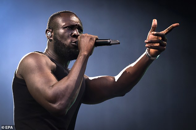 Stormzy was pictured hugging and kissing American singer Victoria at London's Heathrow Airport on Thursday evening, seemingly confirming their relationship.