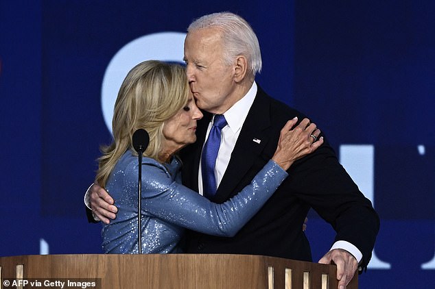 President Joe Biden gives wife Jill Biden a kiss after delivering the keynote speech at the Democratic National Convention in August