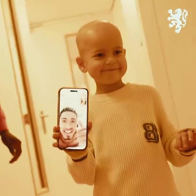 Bellingham also posed for a photo with the young fan while on the video call