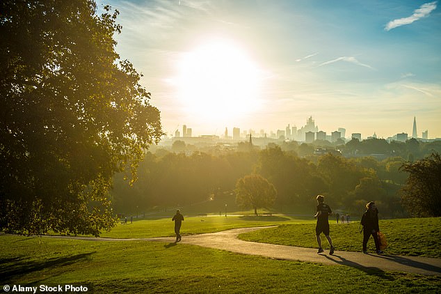 Image of people waking up and running in the park: Spending more time standing is good for your blood sugars and for your bones