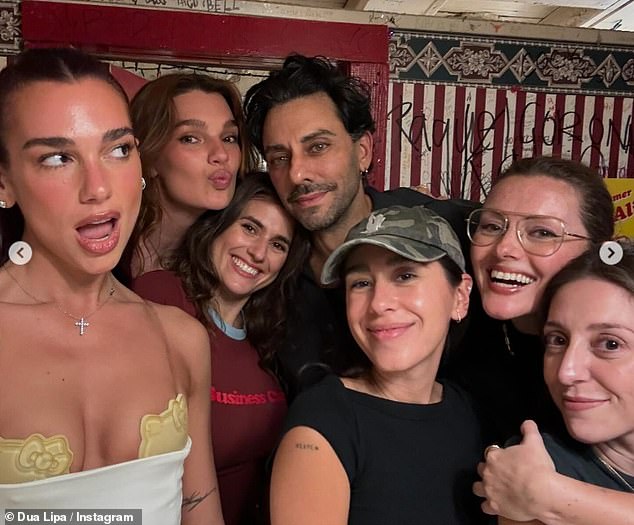 Dua posed for a cute selfie with her friends as she continued to show off her Hello Kitty bra