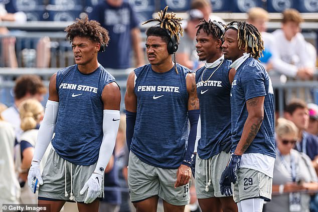 Audavion Collins (right) was scolded by Franklin after the game for planting a flag