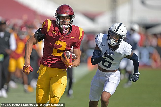 USC Trojans wide receiver Duce Robinson (2) runs the ball on a complete pass before being stopped by Penn State Nittany Lions safety Zakee Wheatley (6)