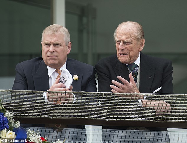 Prince Andrew and his father Prince Philip watched the horse racing at Epsom Downs, in Surrey, in 2016