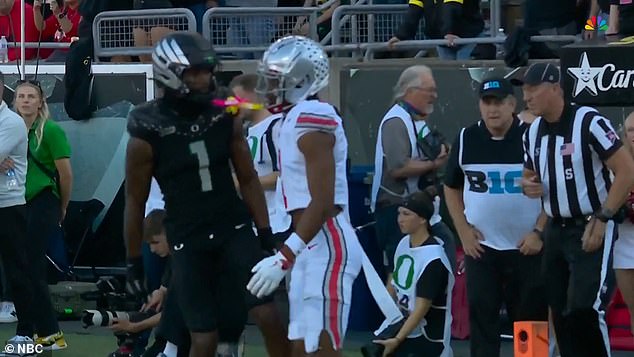 Oregon wideout Traeshon Holden was ejected for spitting on an Ohio State player