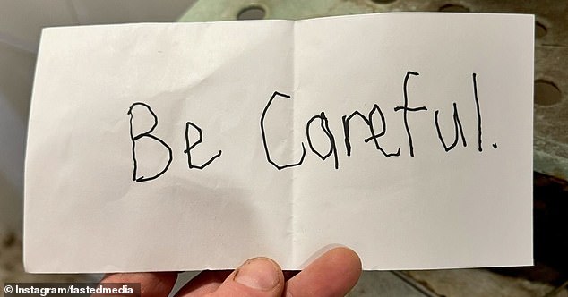 A threatening note (photo) was slipped under the door of the bakery at night