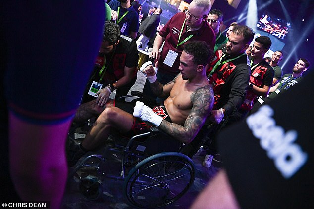 The Olympic silver medalist was subsequently wheeled from the arena due to the injury