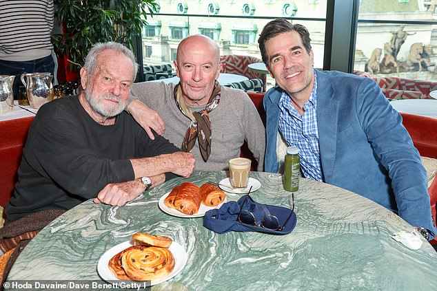 Rob Delaney cut a smart figure in a blue blazer as he posed with Terry Gilliam (L) and Jacques Audiard (middle)