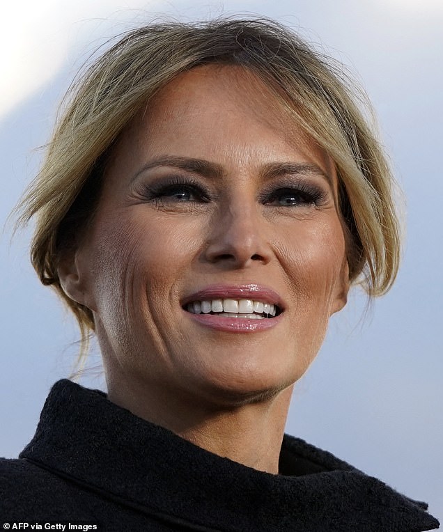 Later, at age 52 (pictured in 2021), her neck skin and jawline look smoother — something that could have been fixed with a facelift, says Dr. Linkov.