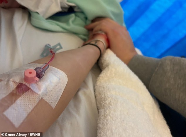 The 21-year-old from Scunthorpe, Lincolnshire has suffered from a range of premenstrual syndrome (PMS) symptoms since the age of nine, including back pain, gastrointestinal problems and hair loss (Grace pictured in hospital)