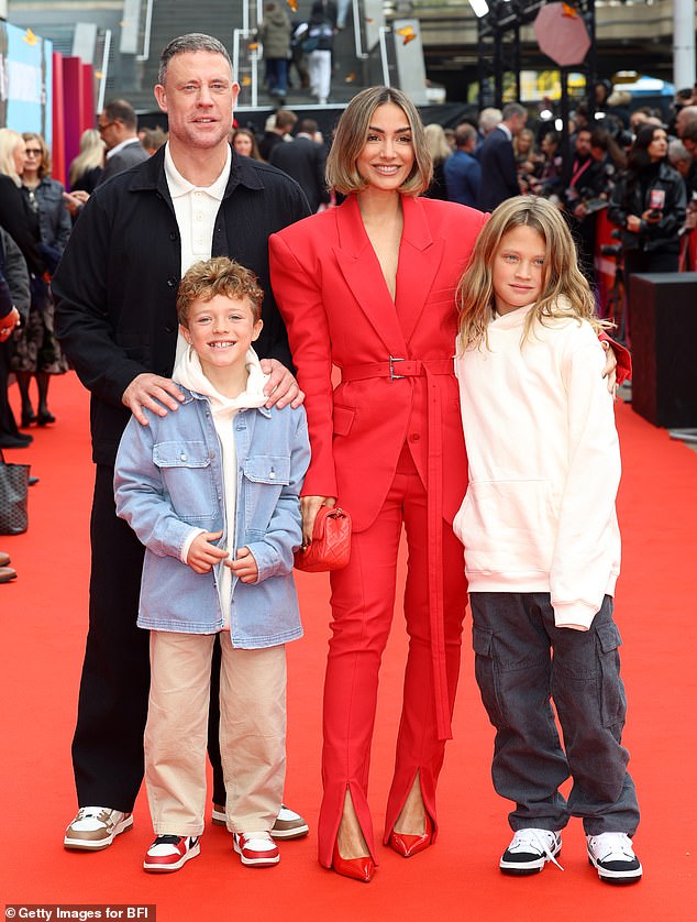 The Loose Women star, 35, was joined by her former footballer husband Wayne, 44, and their two sons Parker, 10, and Carter, eight