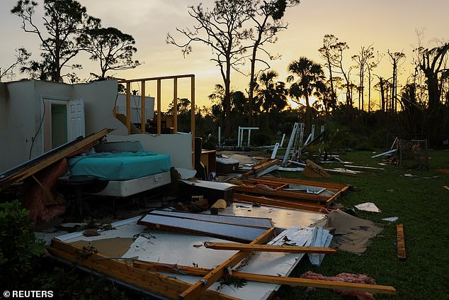 The remains of a building stand after Hurricane Milton made landfall, in Lakewood Park, near Fort Pierce, in St. Lucie County, Florida, USA, October 10, 2024