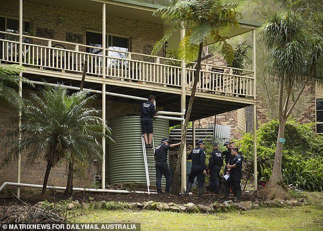 Police search the foster grandmother's home in late 2021 as the task force renewed its investigation into what has become Australia's most high-profile missing child case