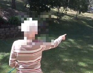 William's foster grandmother points out a policewoman while walking the crime scene where William may have gone