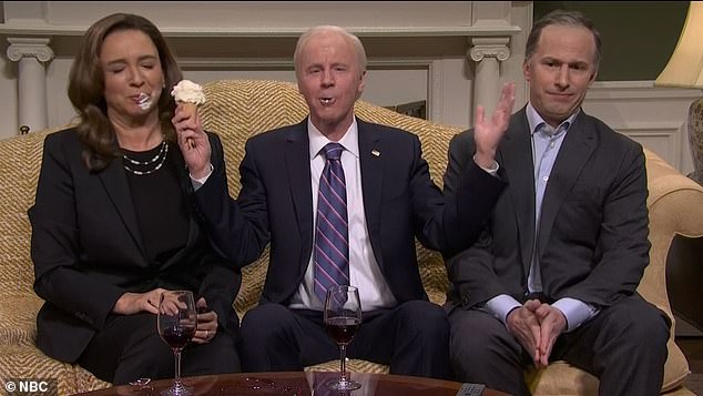 At one point, Biden arrives unannounced and near the end of the piece he waves his arms while holding an ice cream cone and smears some ice cream on her face.