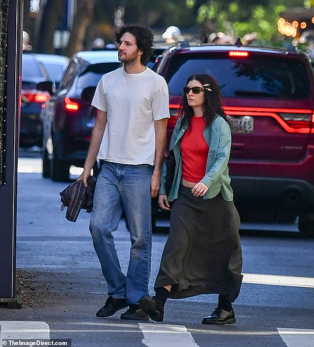 The New Zealand singer appeared close with the producer, who was reportedly helping her with her new album, as they took a stroll around the city.