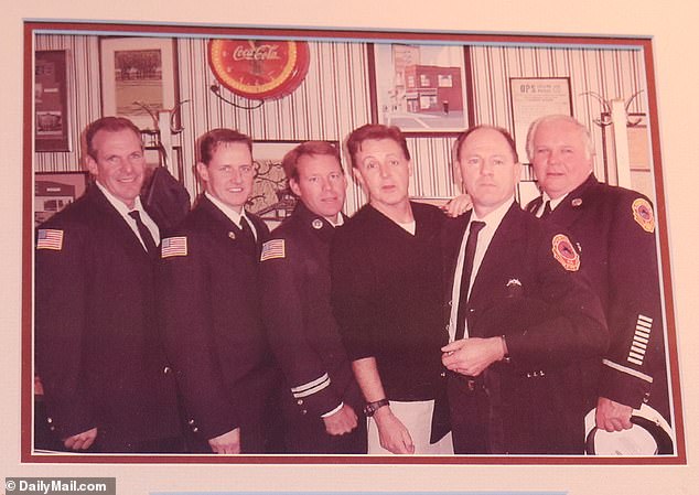 Paul McCartney pictured in the restaurant with firefighters after the September 11 memorial concert